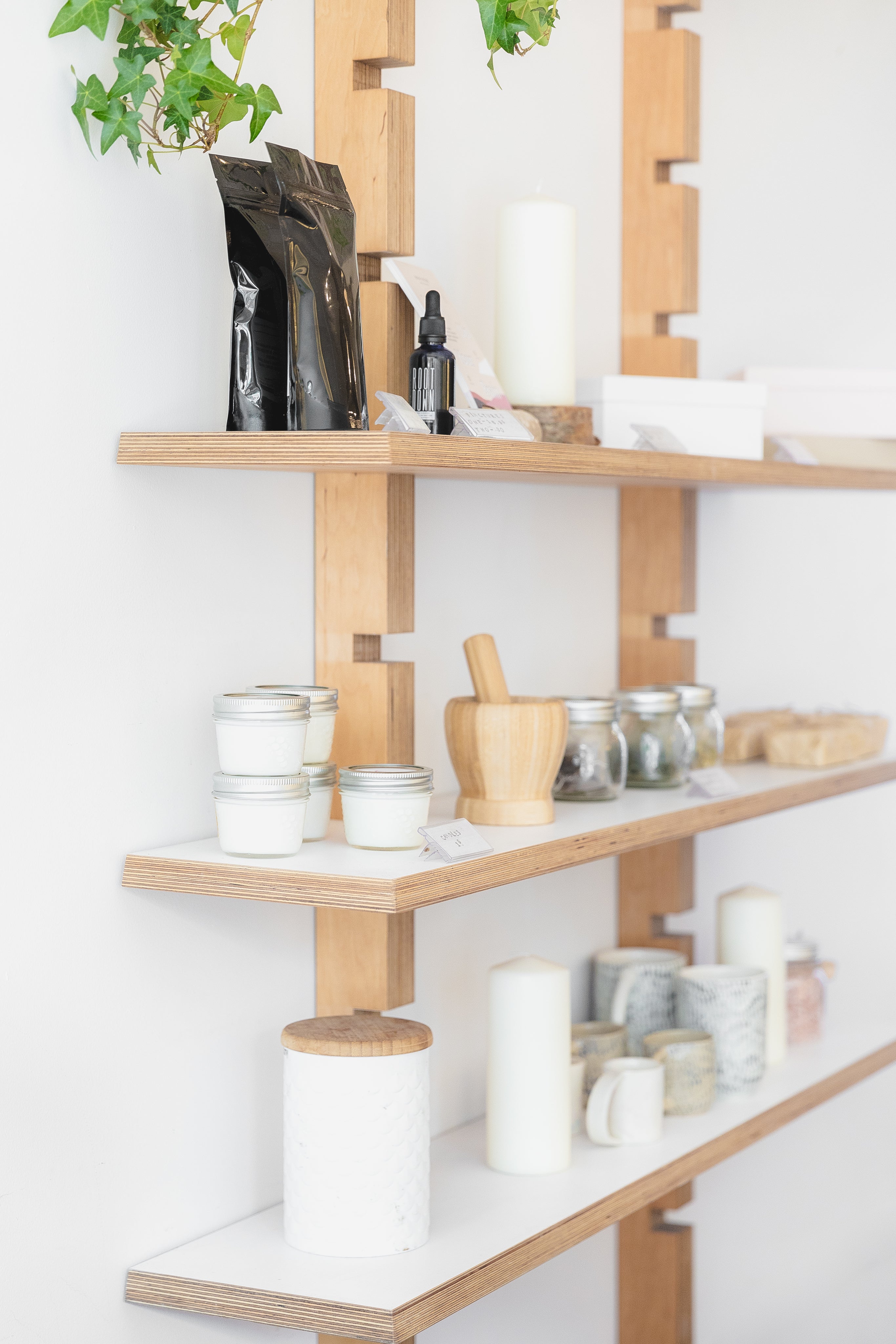files/jars-candles-and-ceramics-on-wooden-shelves.jpg